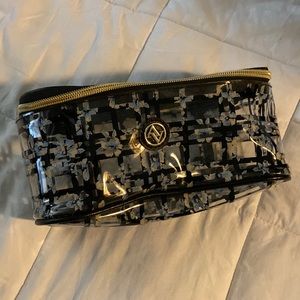 EUC clear with plaid and flowers make up bag